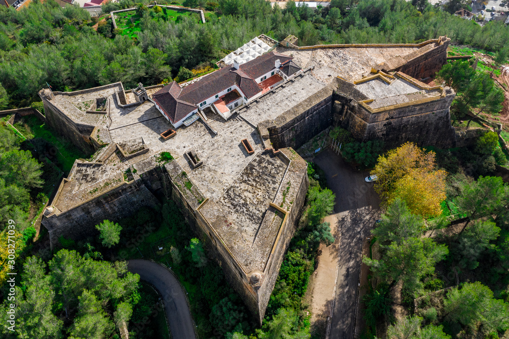 Aerial view of fortress Sao Felipe in Setubal Portugal, star shaped military base protecting the city and the harbor with bastions Aerial view of fortress Sao Felipe in Setubal Portugal, star shaped military base protecting the city and the harbor with bastions