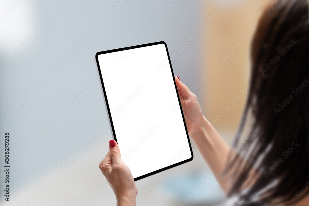 Woman holding tablet in vertical position with isolated screen for app or  web site presentation. Modern tablet with thin, round edges Photos | Adobe  Stock