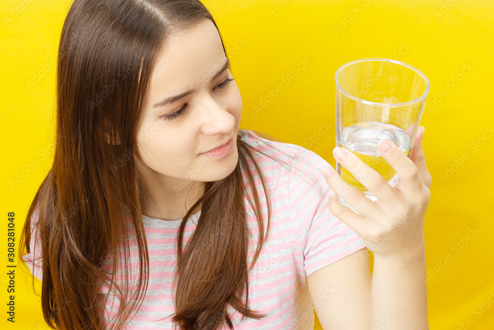 woman with glass of orange juice