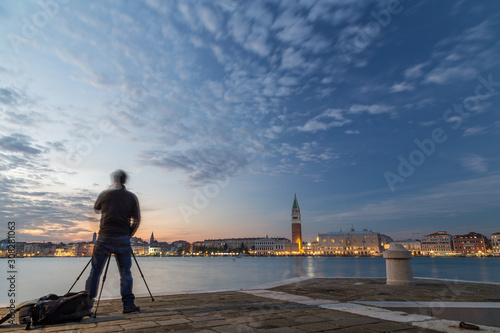 Photographer silouhette in Venice at sunset