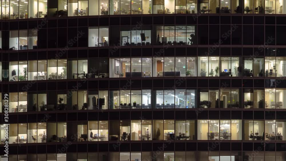 Close view to office windows in Skyscrapers International Business Center City at night timelapse from top, Moscow, Russia. Tilt down and up loop Close view to office windows in Skyscrapers International Business Center City at night timelapse from top, Moscow, Russia. Tilt down and up loop