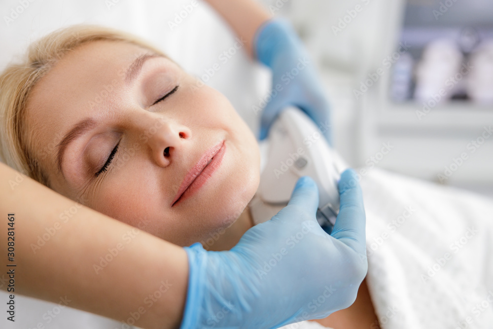 Beautiful adult woman is having lifting procedure Beautiful adult woman is having lifting procedure