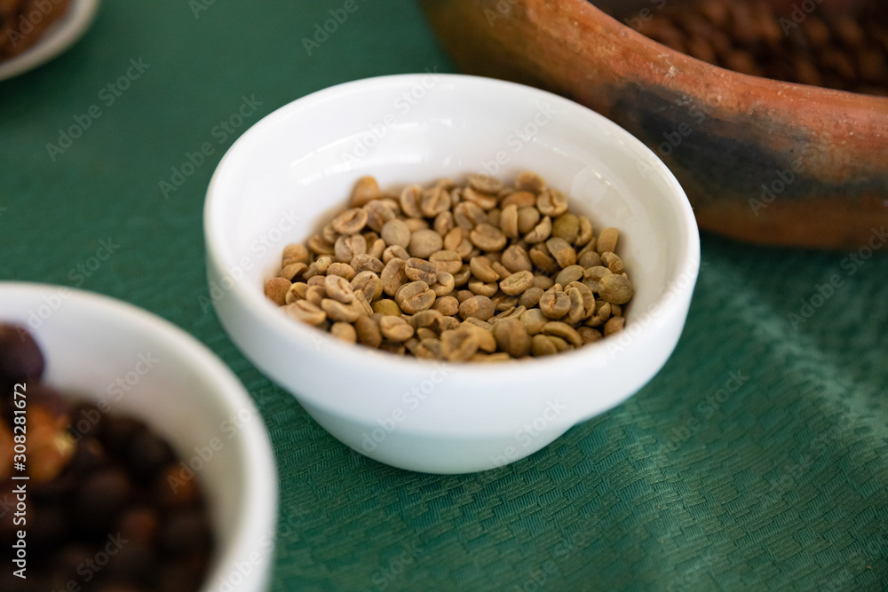 Bowls of beans showing the process of coffee production Bowls of beans showing the process of coffee production