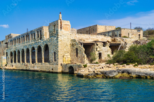 The derelict Lazzaretto was a former quarantine facility and hospital on the shore of Manoel Island, Malta. photo