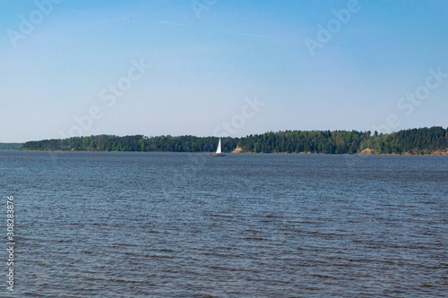 Floating boat in the middle of a lake