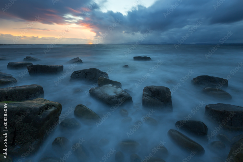 Naklejka premium Sunset on a typical Irish seascape