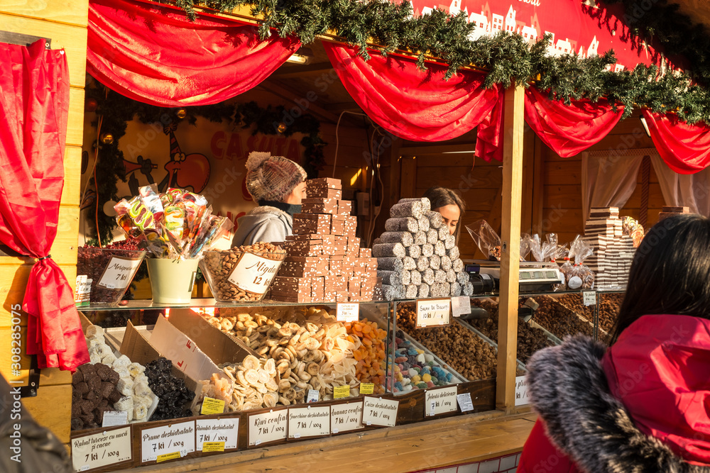 Sibiu, Romania - December 07, 2019. People at the the Traditional Christmas market in the historic center of Sibiu, Transylvania, Romania.