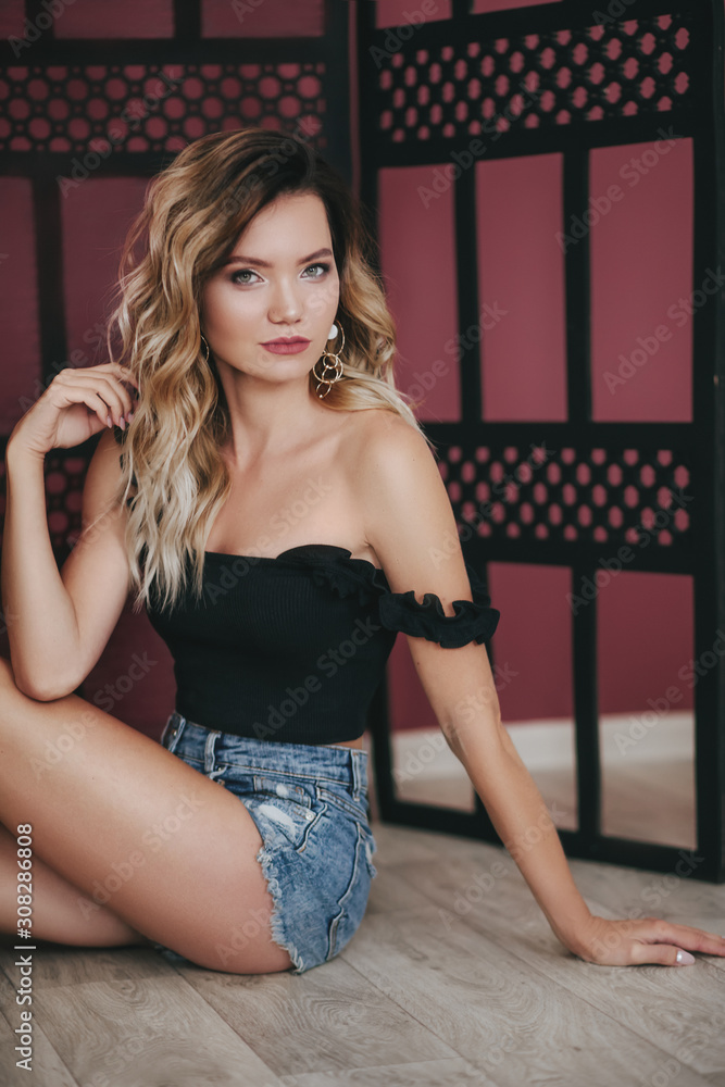 Fototapeta premium Portrait of beautiful young woman with makeup