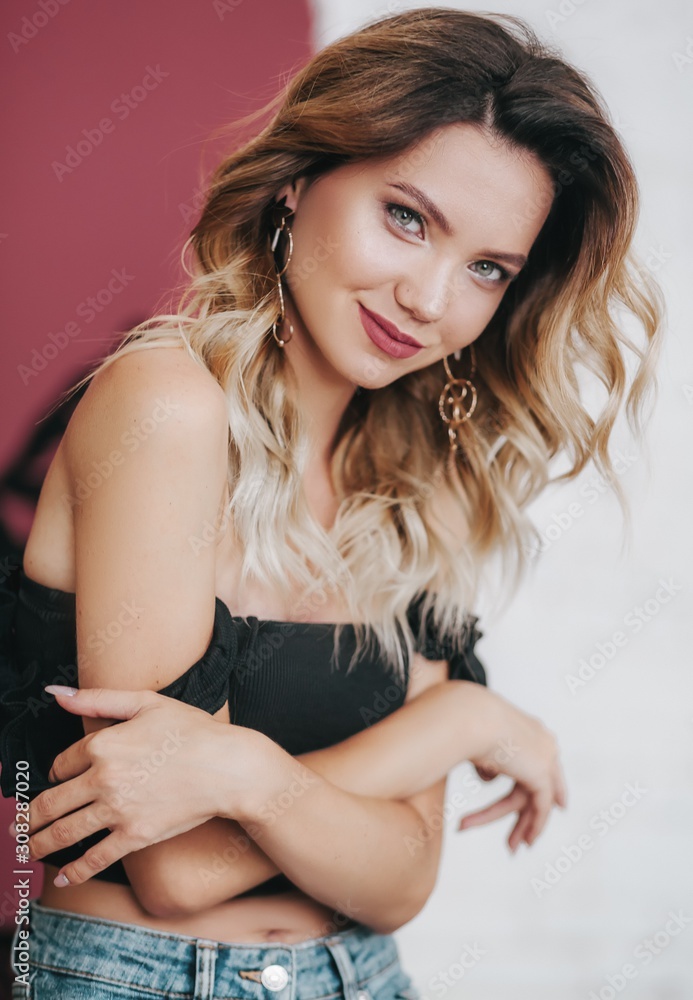 Fototapeta premium Portrait of beautiful young woman with makeup