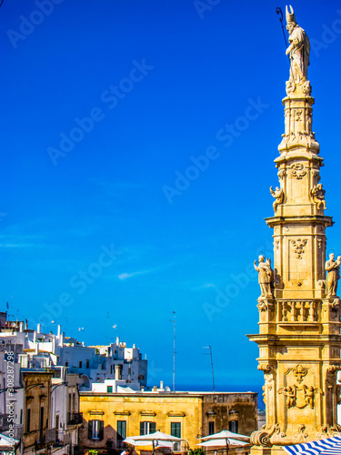 Column of St. Oronzo in Ostuni, Italy photo