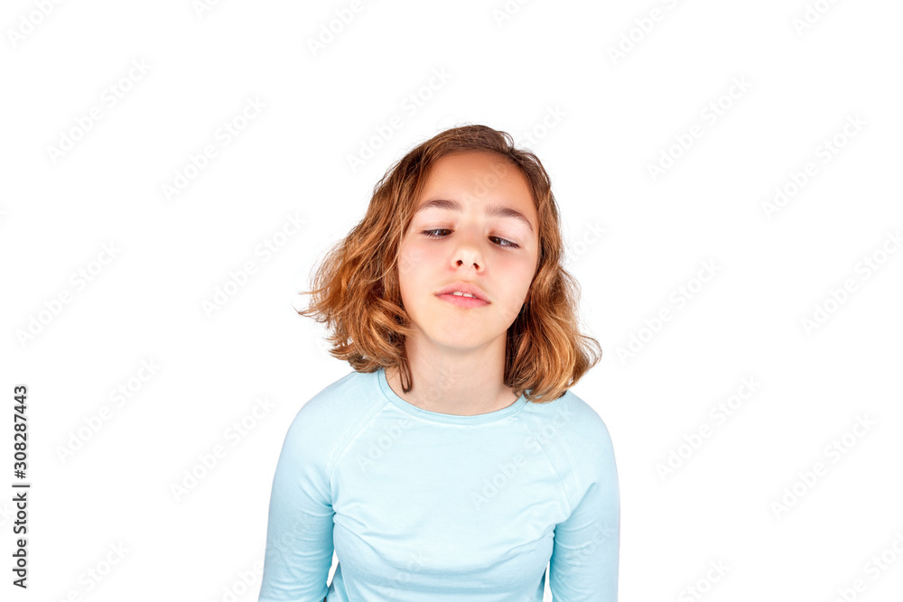 Cute teenager girl with funny face expression looking to camera, isolated. April fool day
