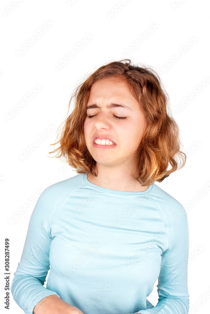 Squeamish teenager. Beautiful girl with a squeamish expression Squeamish teenager. Beautiful girl with a squeamish expression