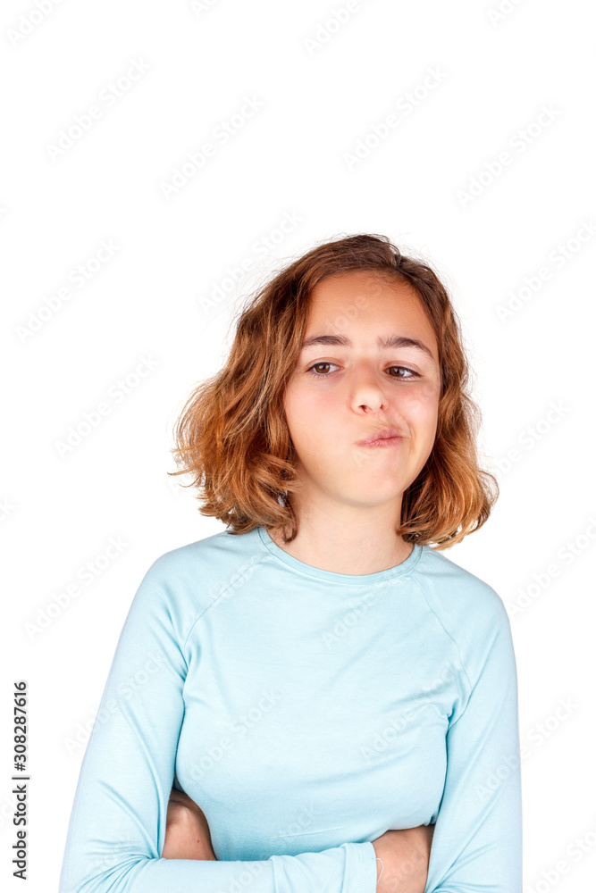 Cute teenager girl with funny face expression looking to camera, isolated. April fool day Cute teenager girl with funny face expression looking to camera, isolated. April fool day