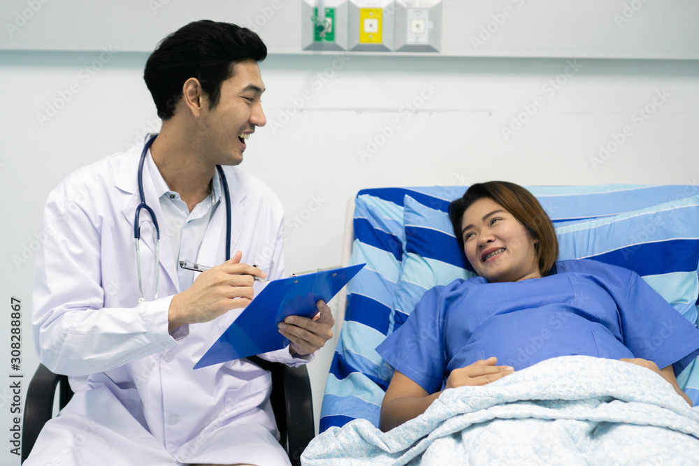 doctor examining pregnant patient doctor examining pregnant patient