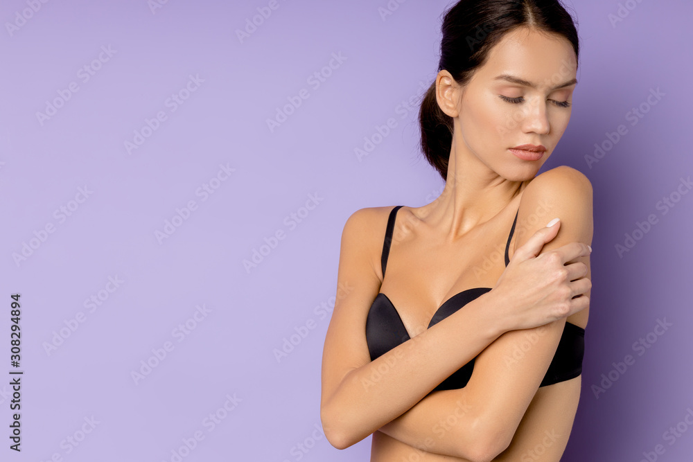 caucasian woman with perfect figure stand isolated over purple background, young brunetee in brassiere caucasian woman with perfect figure stand isolated over purple background, young brunetee in brassiere
