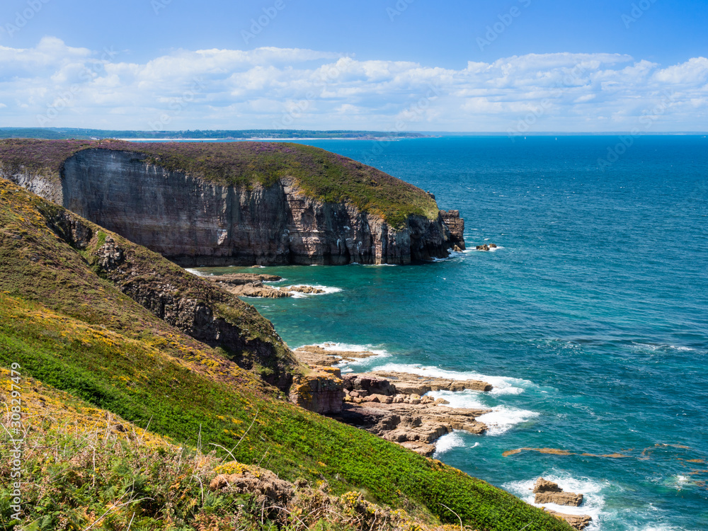 A scenic view of the cliffs on a coast of the Atlantic ocean.