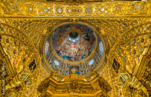 Finely golden ornate dome in the Basilica of San Juan de Dios in Andalusia  Granada  Spain.