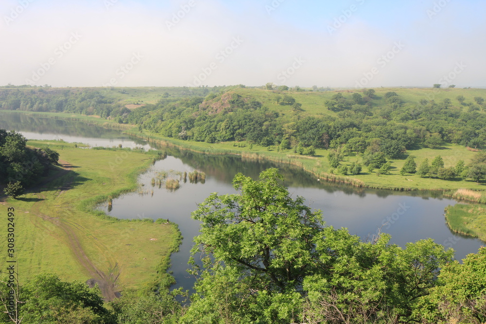 Fototapeta premium landscape with river and blue sky