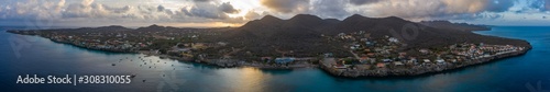 Aerial sunrise view of coast of Curaçao in the Caribbean Sea with turquoise water and cliff around Westpunt