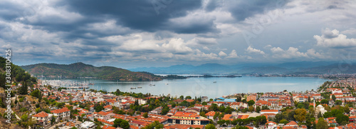 Fototapeta Naklejka Na Ścianę i Meble -  Panoramic view of Fethiye city and the sea bay, panorama from a several shots.