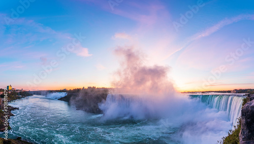 Niagara Falls is a group of three waterfalls at the southern end of Niagara Gorge, between the Canadian province of Ontario and the US state of New York