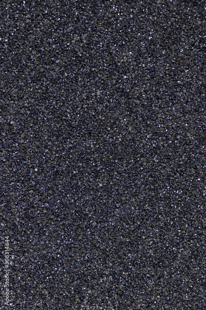 Layer of black crystals covering full frame Layer of black crystals covering full frame