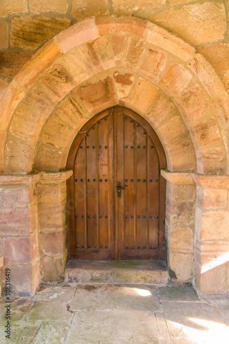 Ancient romanesque wooden door