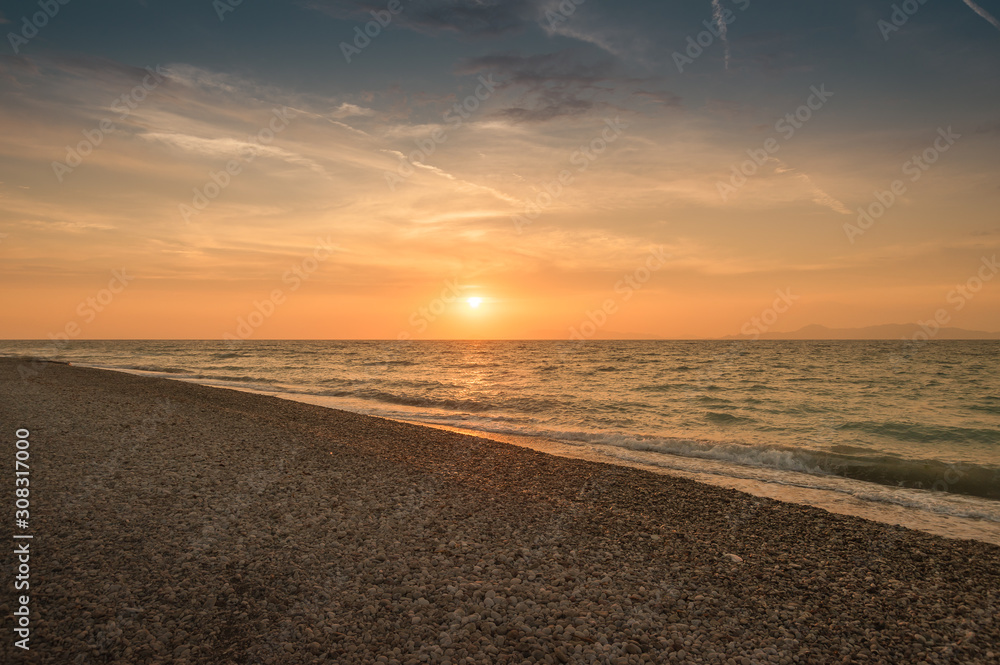 Obraz premium Sunset over sea. Dusk.