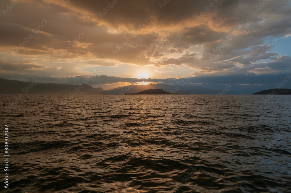 Fototapeta premium Sunset over sea. Dusk.