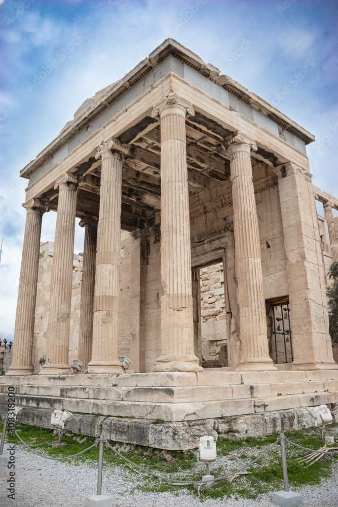 Naklejka premium Erechtheion or Erechtheum ancient Greek temple on the north side of the Acropolis of Athens in Greece dedicated to Athena and Poseidon.