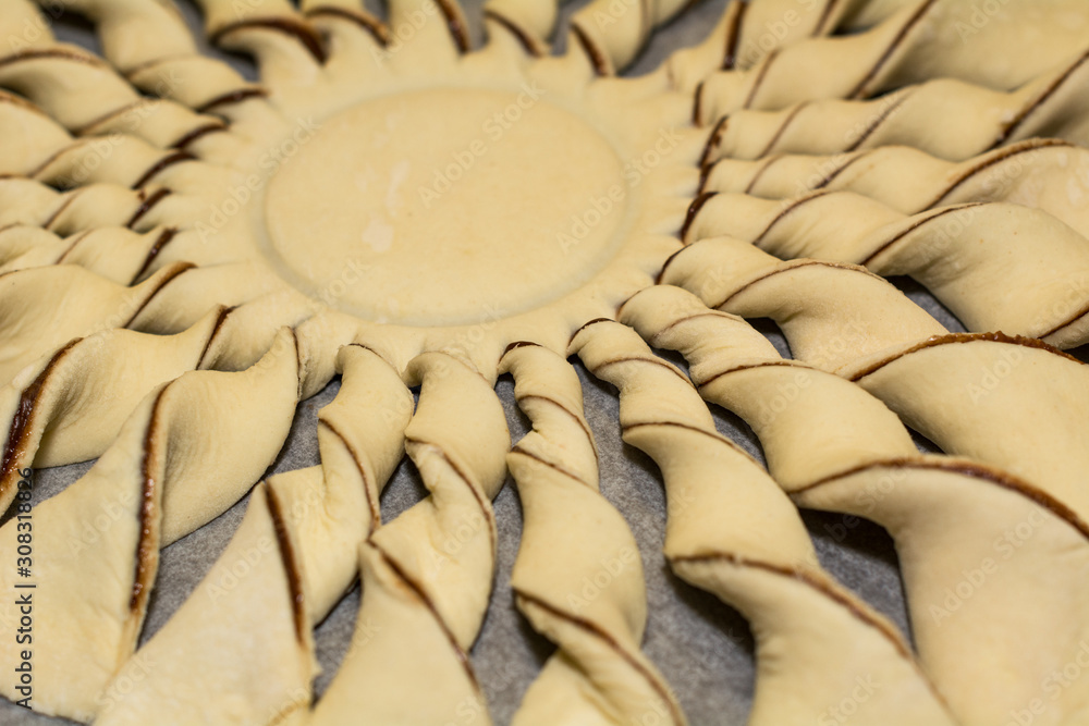 Fototapeta premium Pastry puff pastry with chocolate filling close up