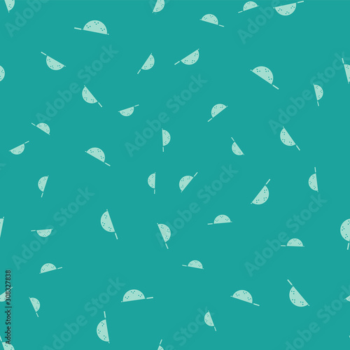 Green Kitchen colander icon isolated seamless pattern on green background. Cooking utensil. Cutlery sign. Vector Illustration