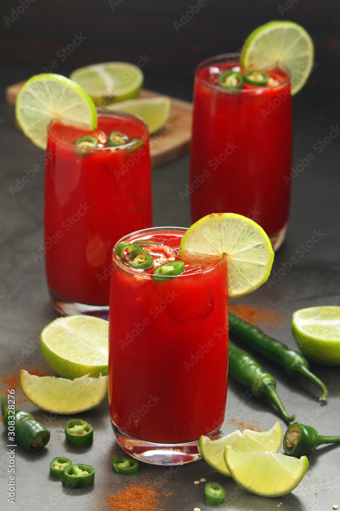 Jalapeno tomato margarita cocktail with lime Jalapeno tomato margarita cocktail with lime