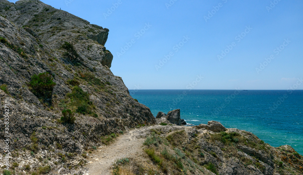 Hiking trail along bottom of Alchak mountain at Sudak, Crimea.