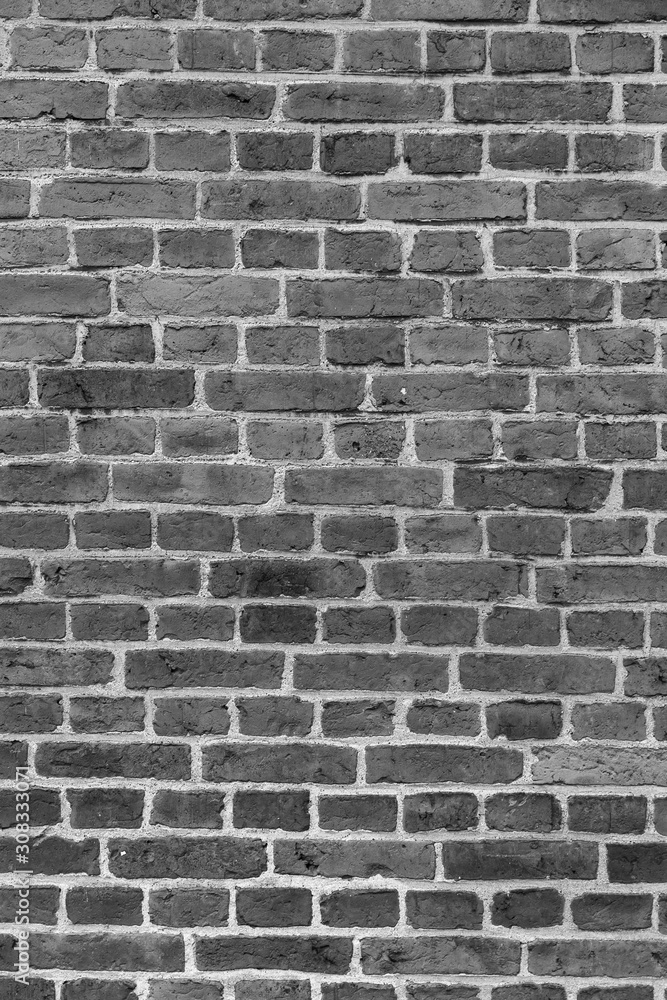 Dekorative alte Backsteinmauer in schwarz weiss Dekorative alte Backsteinmauer in schwarz weiss