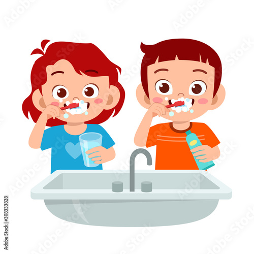 happy cute kid boy and girl brush clean teeth