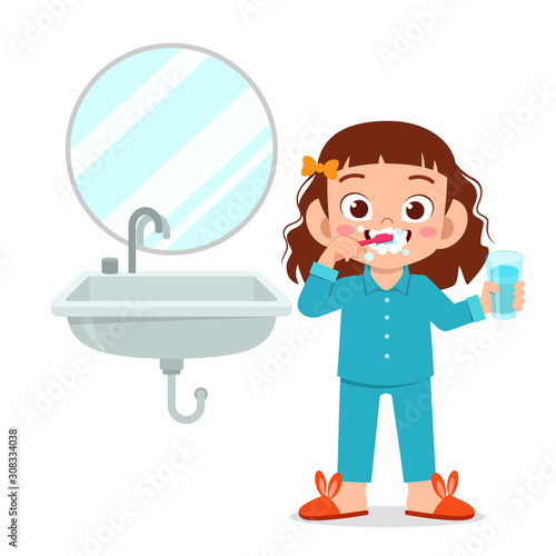 happy cute kid girl brush clean teeth