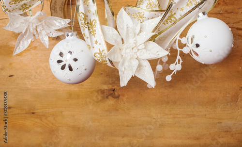 white christmas decorations over wooden background