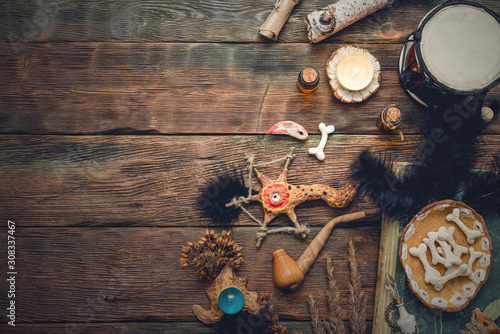 Witchcraft table. Witch doctor. Shamanic accessories. Old magic book.
