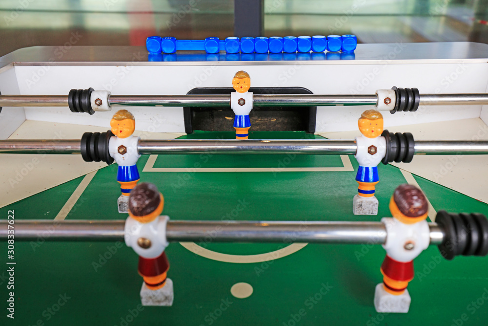 dolls of a retro foosball table to play table football dolls of a retro foosball table to play table football
