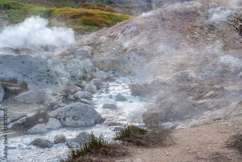 valley of geysers, green valley of soaring geysers, warm water vapor