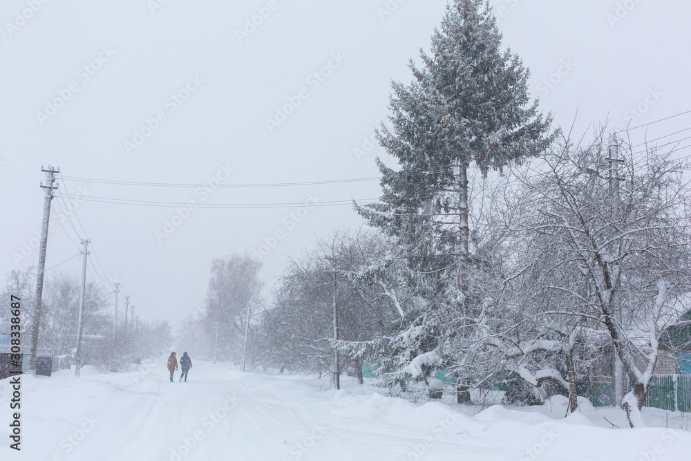 Winter, rural streets are covered with snow. Snow blizzard Winter, rural streets are covered with snow. Snow blizzard
