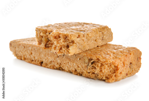 Tasty granola bars on white background