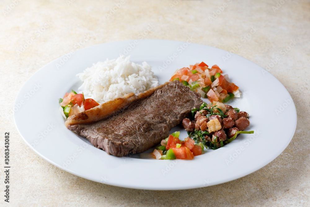 Traditional cuban food with meat and rice Traditional cuban food with meat and rice