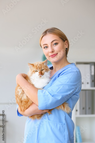 Female veterinarian with cu...