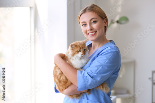 Female veterinarian with cu...
