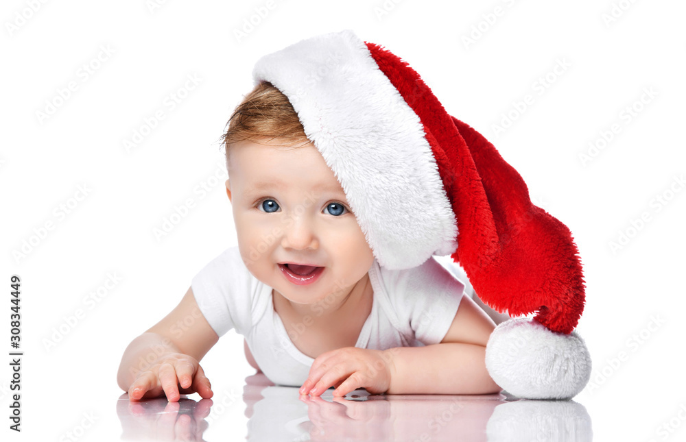 New Year concept. Collage of infant child baby boy lying in red christmas santa hat happy smiling isolated New Year concept. Collage of infant child baby boy lying in red christmas santa hat happy smiling isolated