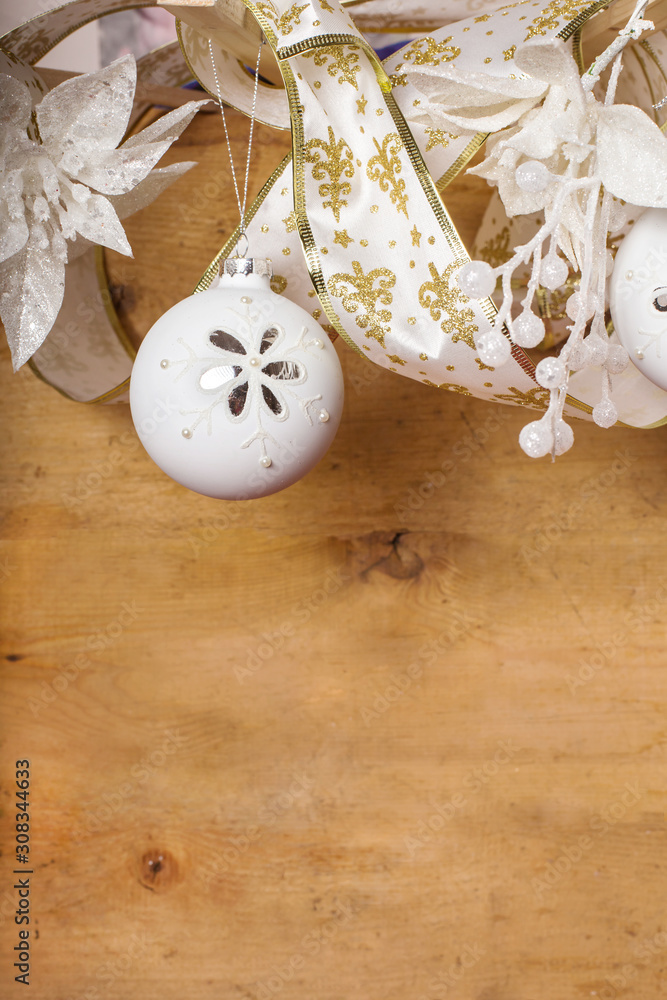 white christmas decorations over wooden background white christmas decorations over wooden background
