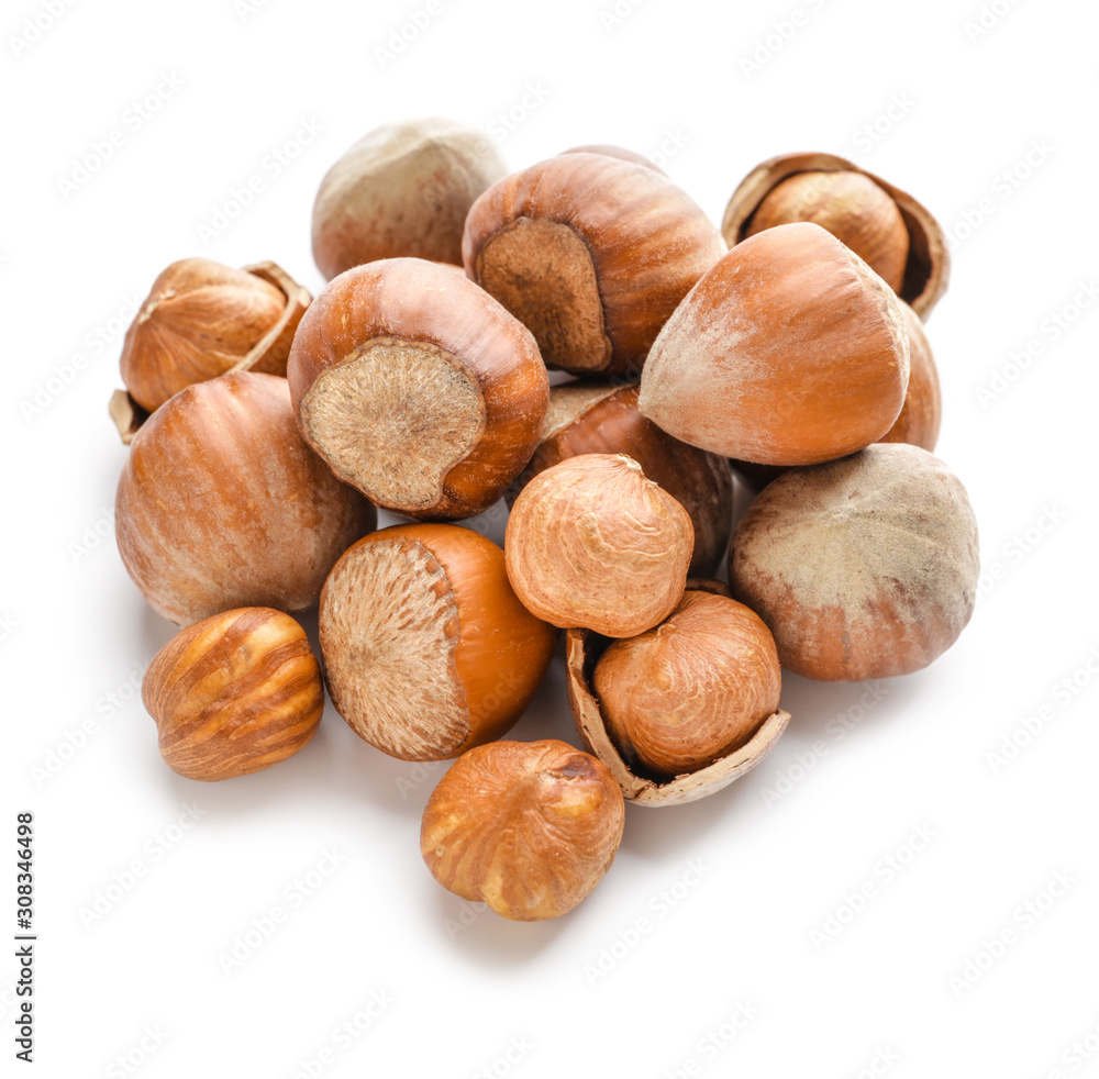 Tasty hazelnuts on white background Tasty hazelnuts on white background