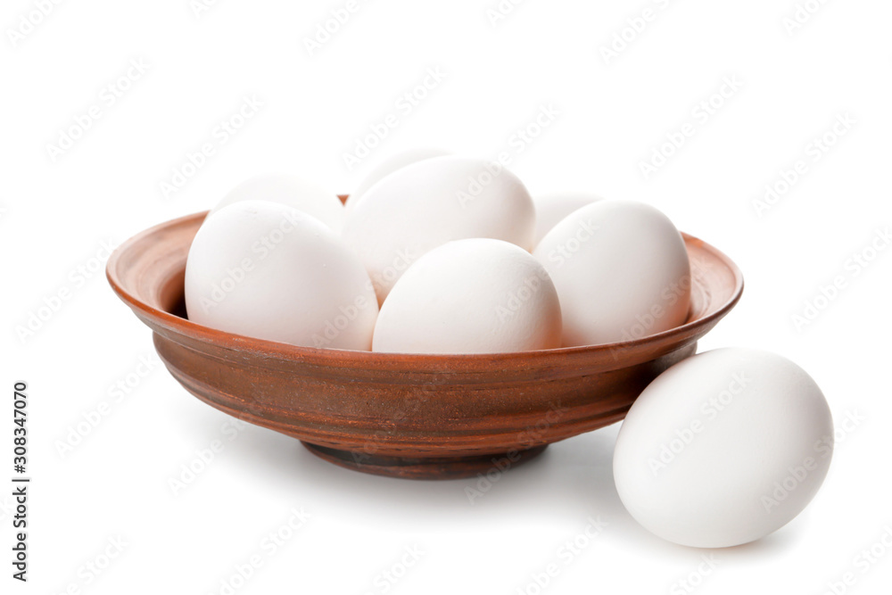 Bowl with fresh raw eggs on white background Bowl with fresh raw eggs on white background